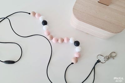 Gabriella-avainnauha olan yli